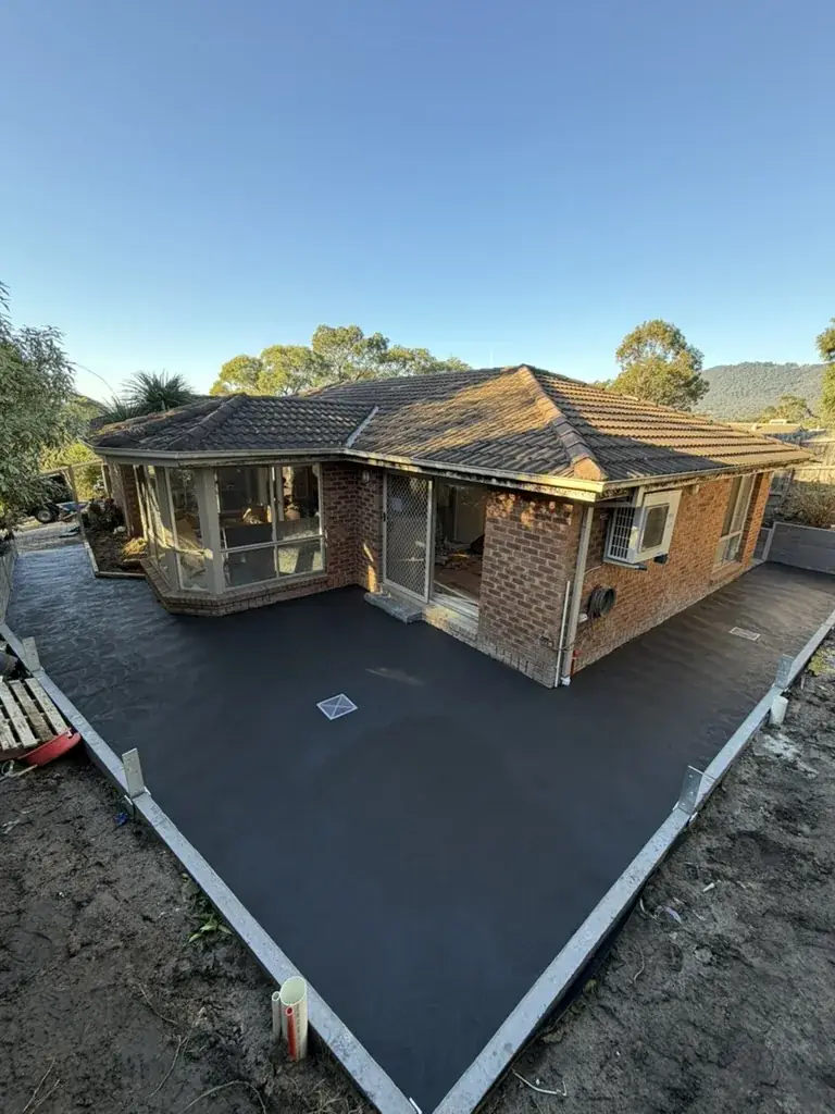 Concrete sleeper walls, steps and slab