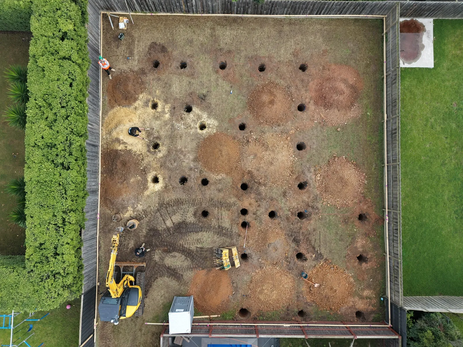 Auger attachment drilling pier holes